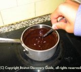 Boston Cream Pie dish - shows chocolate ganache being stirred