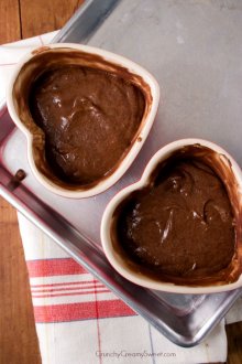 Chocolate dessert batter in ramekins Molten Lava Cakes