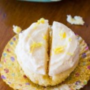 Delicious and simple Homemade Lemon Cupcakes with creamy vanilla frosting! sallysbakingaddiction.com