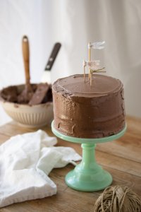 Layered with a creamy fudge frosting, this easy-to-make chocolate layer cake is moist with a deep chocolate flavor. | prettysimplesweet.com