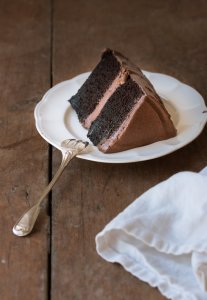 Layered with a creamy fudge frosting,  this easy-to-make chocolate layer cake is moist with a deep chocolate flavor. | prettysimplesweet.com