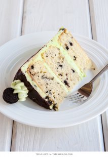 Mint Cookies 'N Cream Cake with crushed cookies in the cake and frosting plus a chocolate drip | by Tessa Huff for TheCakeBlog.com